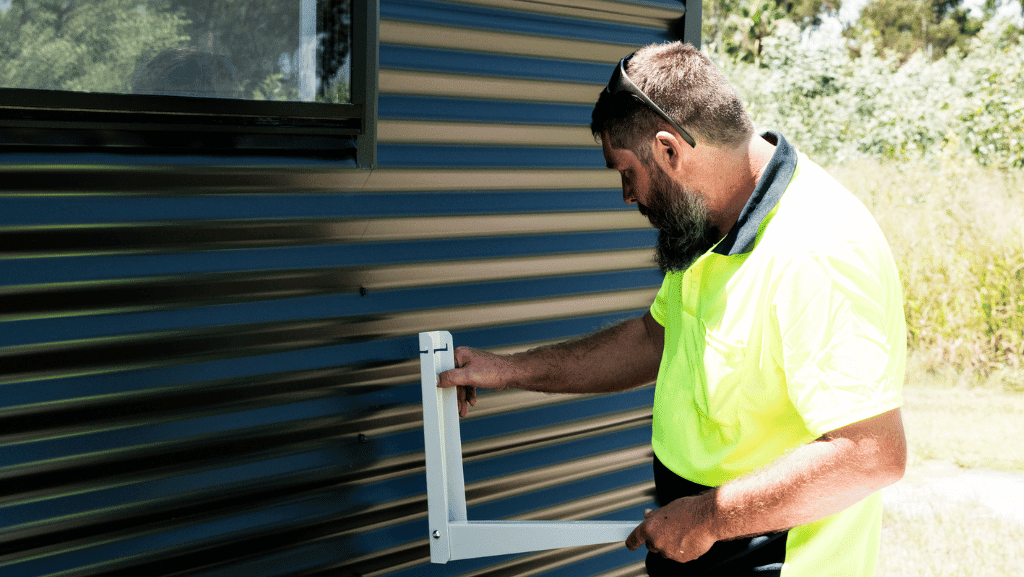 fitting aircon unit 10.7m Complete Build GM Portable Homes
