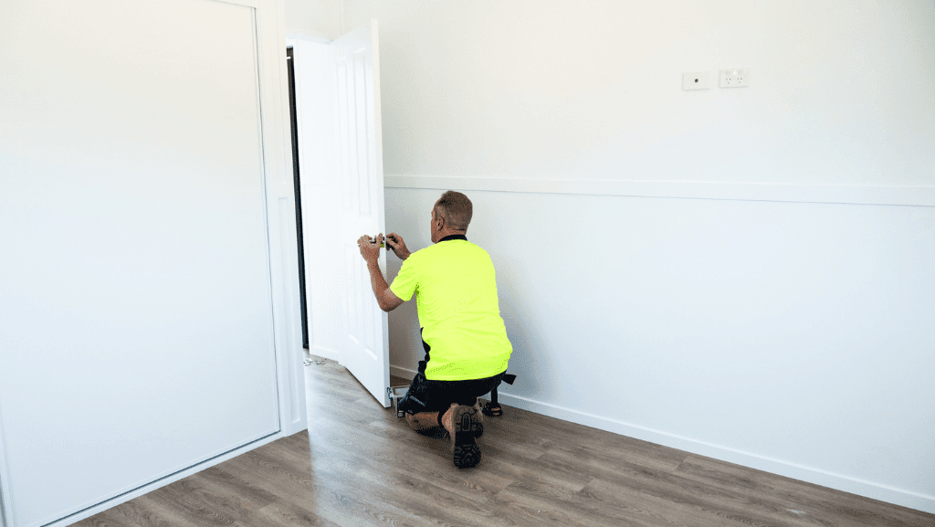 Door fitting 10.7m Complete Build GM Portable Homes